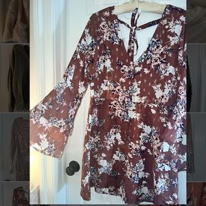 Floral cow sleeve dress. Worn once. Size large.